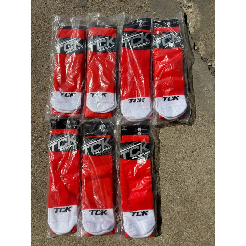 TCK over the calf softball/baseball socks. New in package! Size MEDIUM